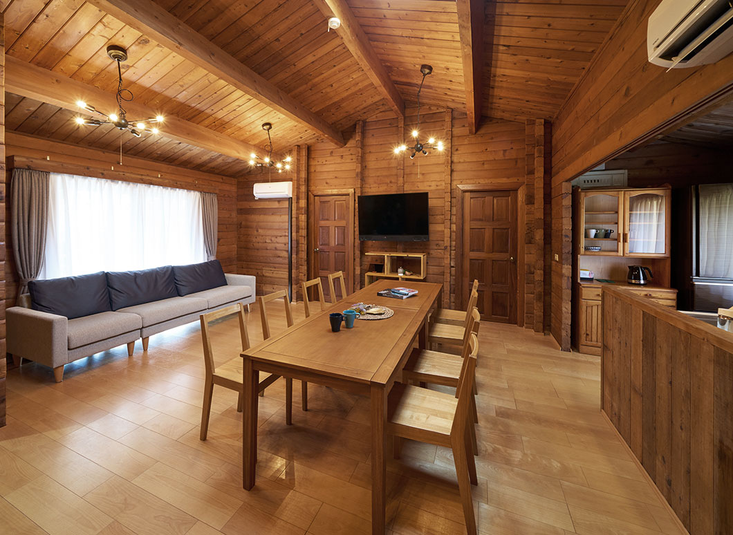 Log Cottage living room at Resol no Mori