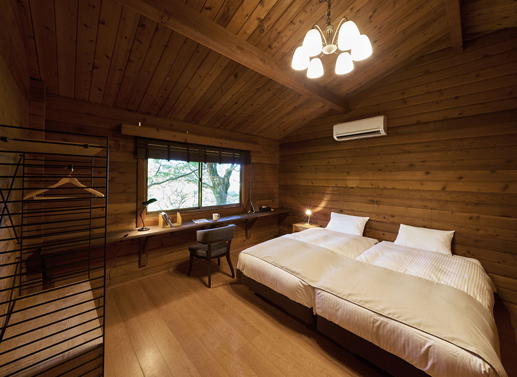 Log Cottage bedroom at Resol no Mori